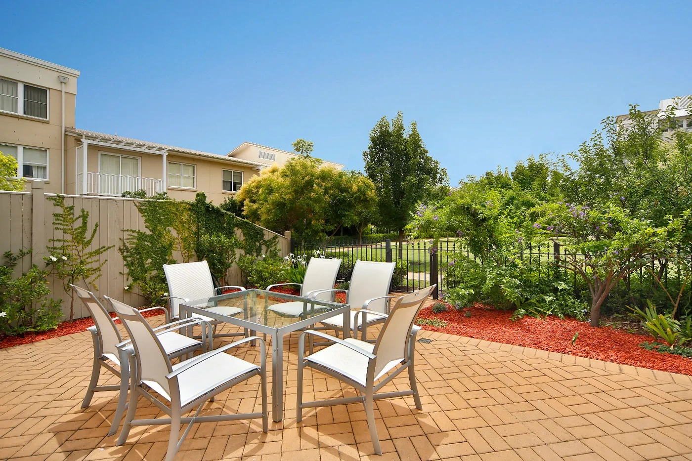 Landscaped courtyard terrace at a Westprecinct serviced residence in Breakfast Point