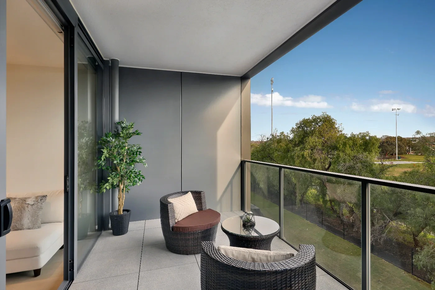 Furnished balcony with parkland outlook at the Armadale residence