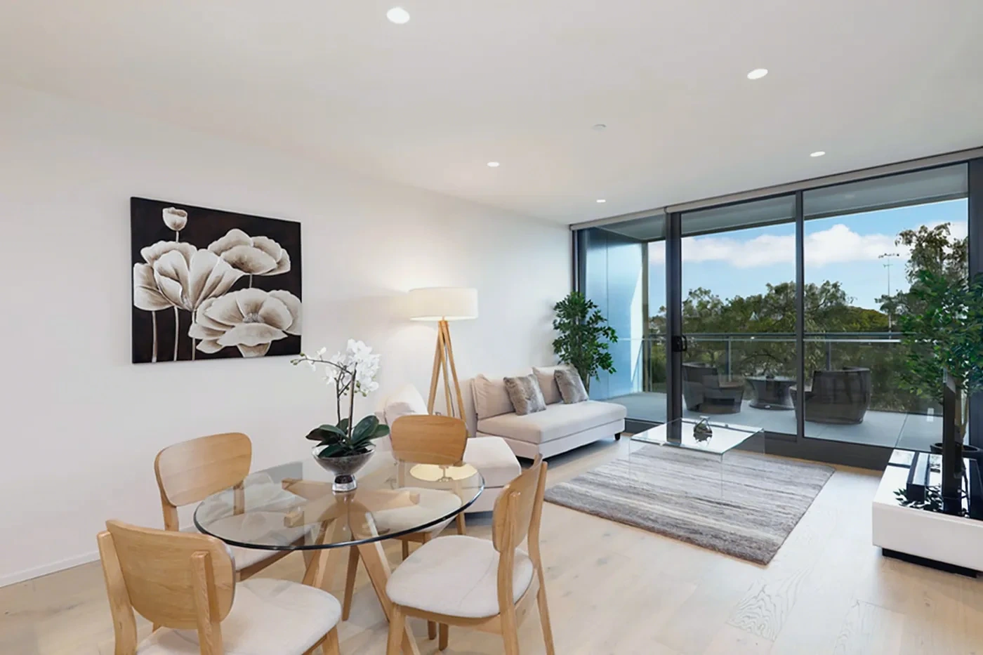 Living and dining area with designer furnishings in the Armadale residence