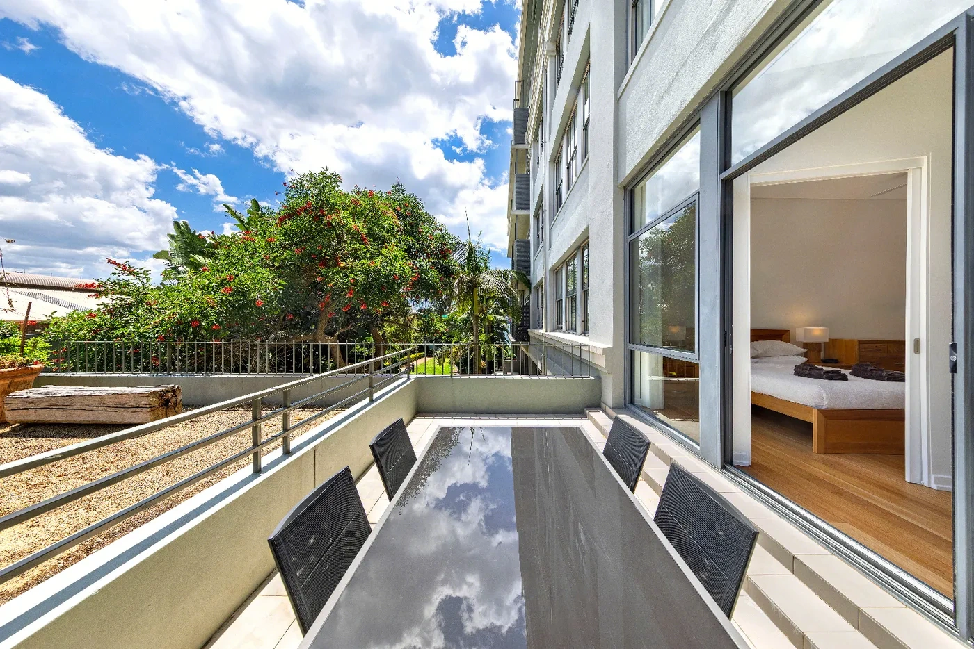 Extra-large ground-floor terrace with outdoor dining and leafy outlook at The Peninsula, Balmain
