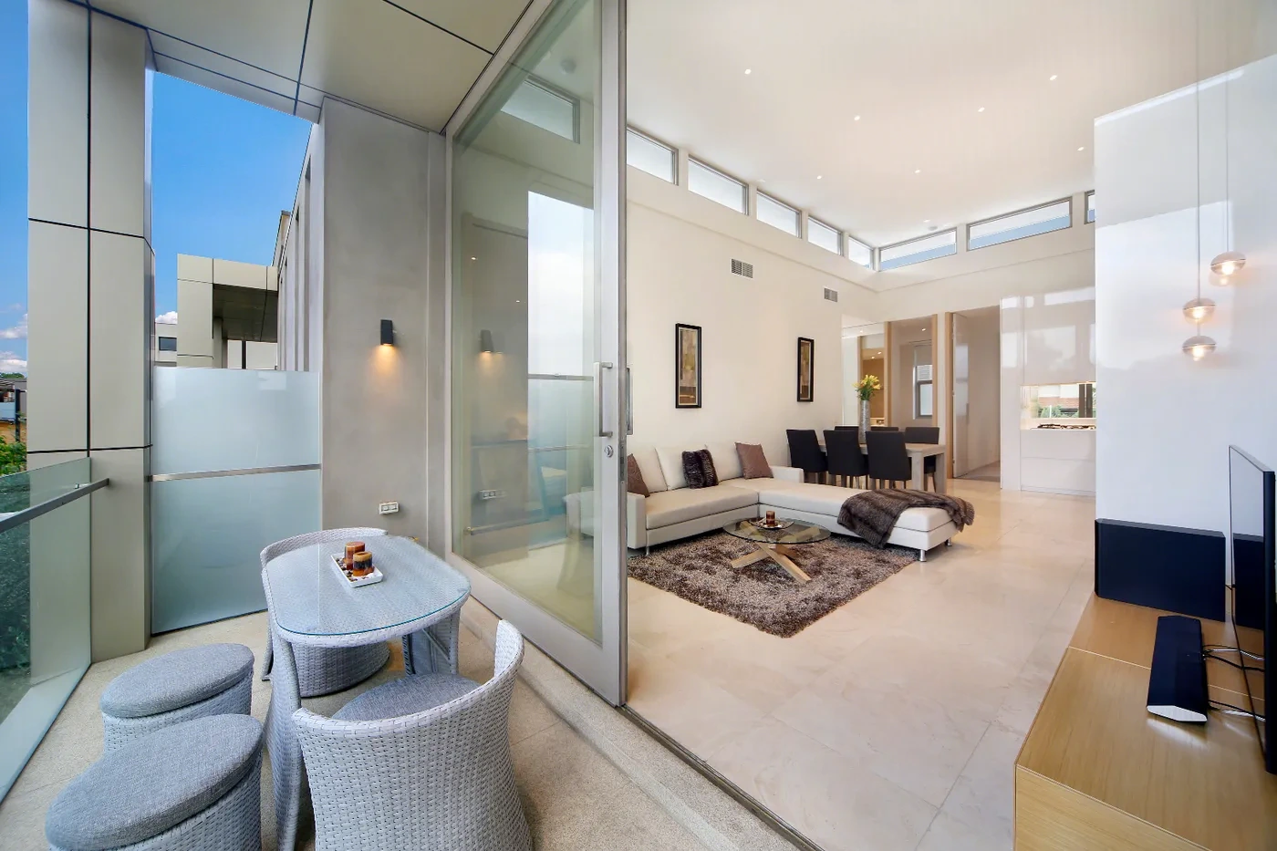 Balcony and open-plan living in the Brighton penthouse