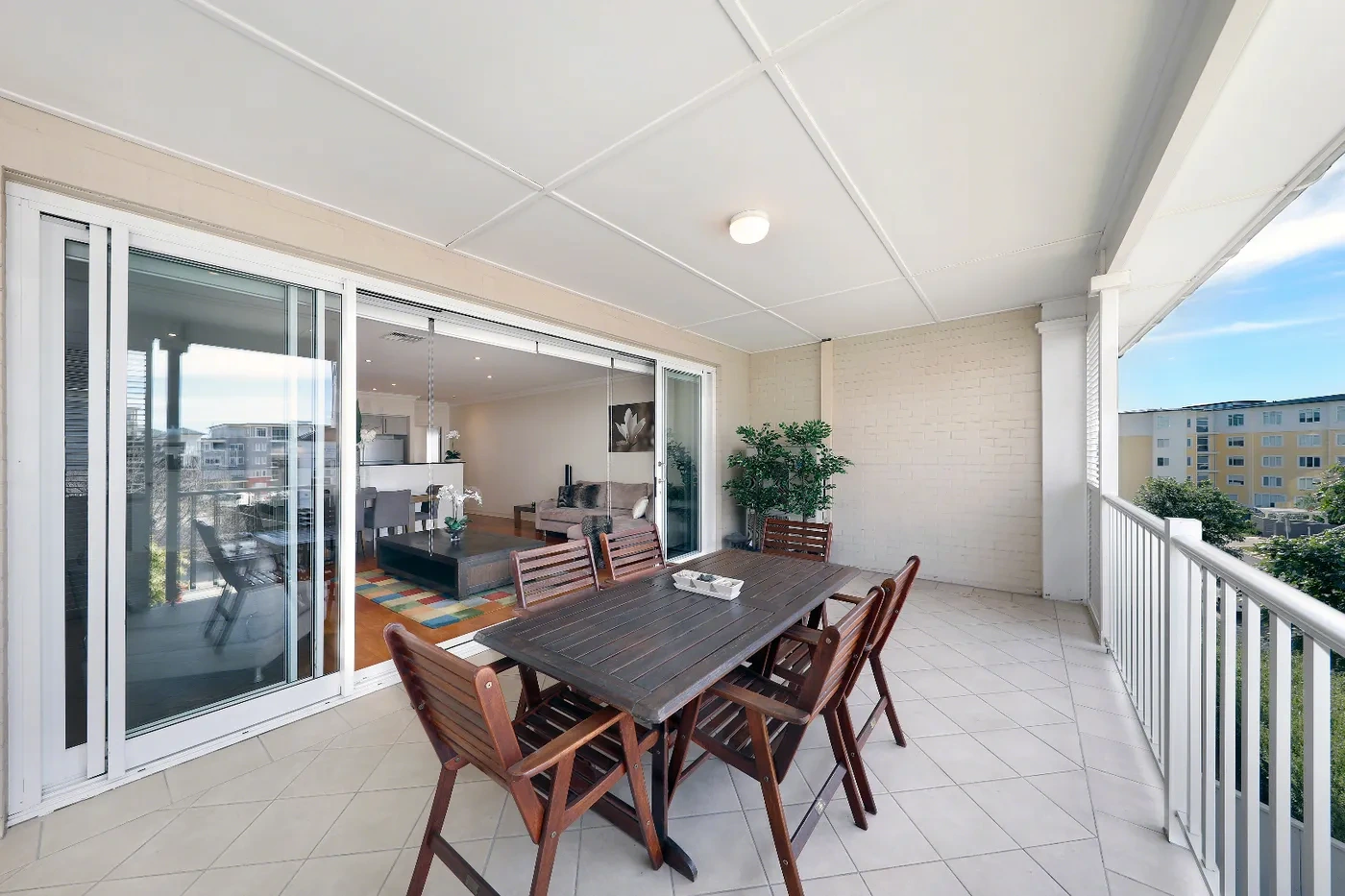 Sunny balcony overlooking the pool in Breakfast Point