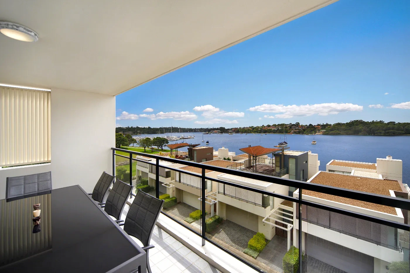 Water-view balcony with park and bay outlook at the Cabarita residence