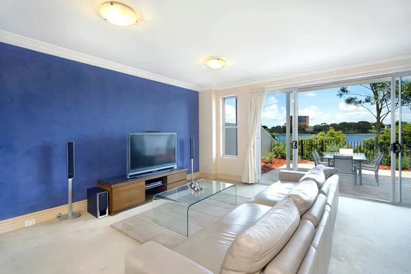 Waterfront townhome living area in exclusive Cabarita enclave