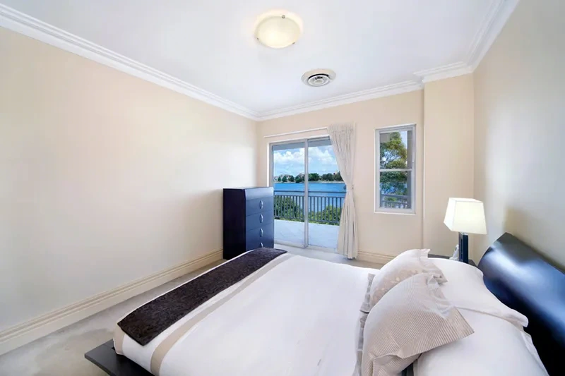 Furnished master bedroom in the waterfront townhome