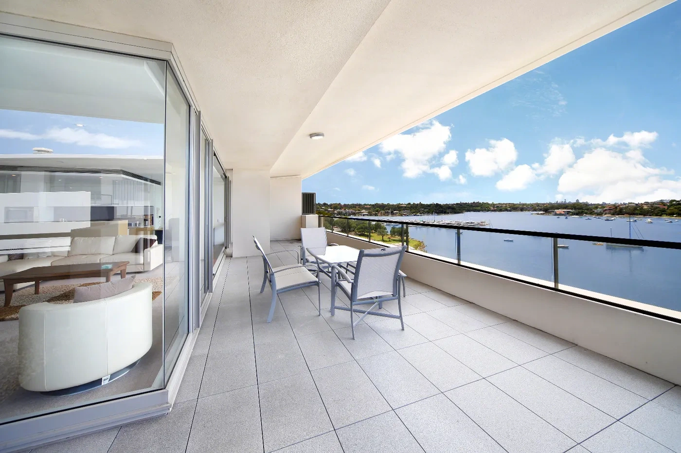 Wrap-around terrace with river views at a Westprecinct serviced residence in Cabarita