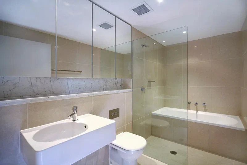Luxe floor-to-ceiling stone bathroom