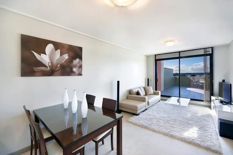 Fresh, modern furnished open-plan living and dining area