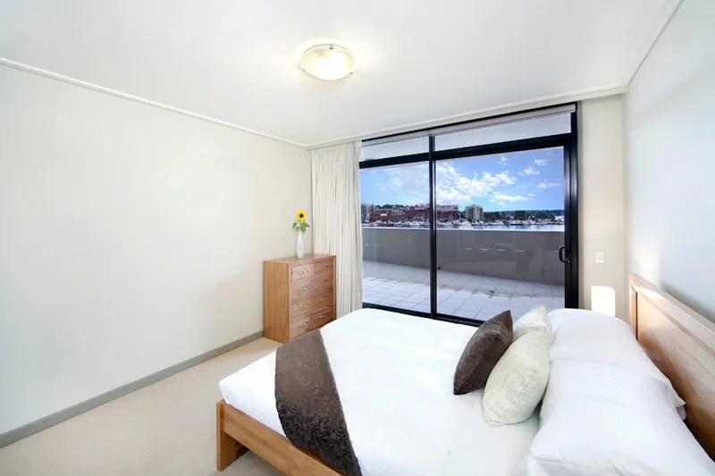 Furnished master bedroom with mesmerising water views