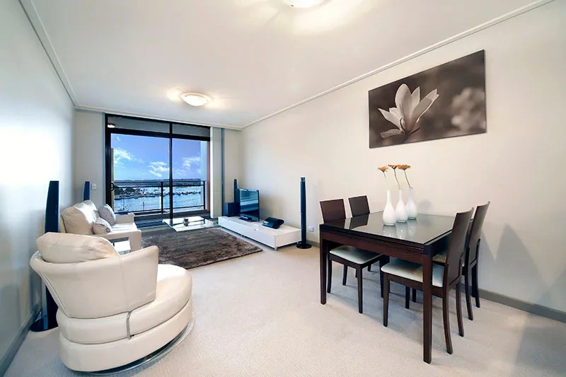 Stylish furnished dining area with water outlook