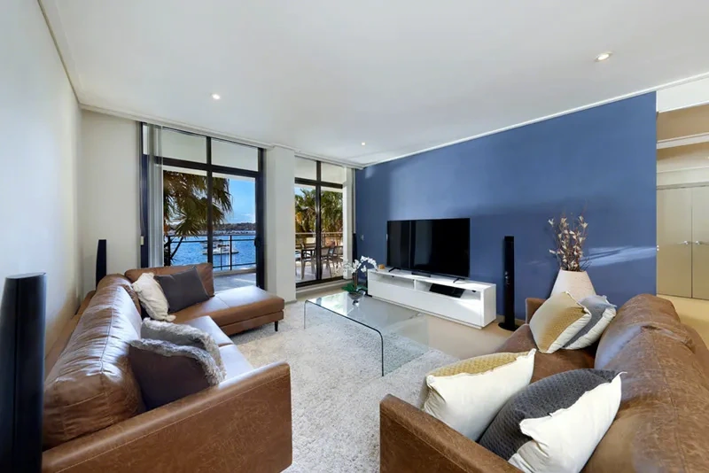 Spacious living area with contemporary designer furnishings