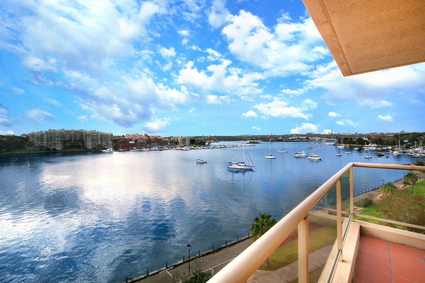 Waterfront balcony view across the bay from a Westprecinct serviced residence in Rozelle