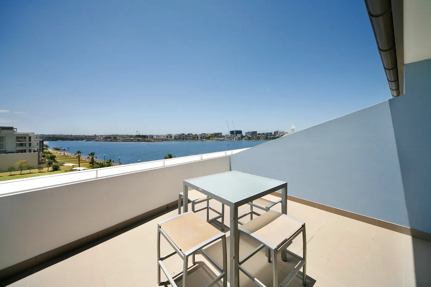 Balcony with waterfront views at a Westprecinct serviced residence in Wentworth Point